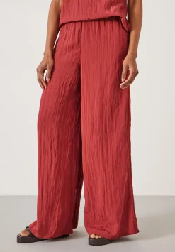 hush Trousers|Mabel Fluid Wide Leg Crinkle Trousers Rust